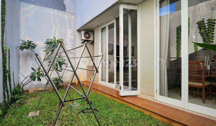 Rumah Modern Tropis Semi Furnished Di Setu Cipayung 9