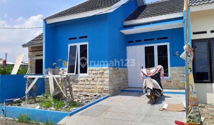 Top rumah baru 200 mtr jln raya WolterMonginsidi  2