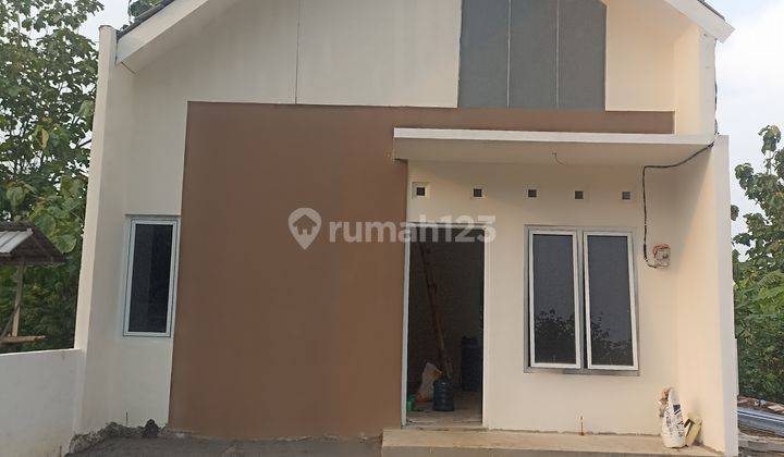 Rumah 1 Lantai Perkotaan Dengan Suasana Asri 2