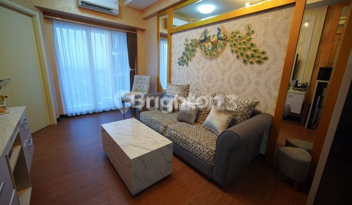 Apartemen Amor di atas Mall Pakuwon City 1