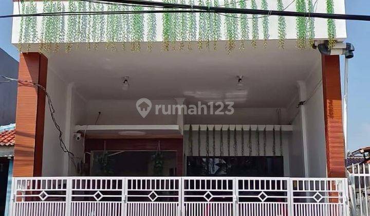 Jual Rumah Murah, Bebas banjir, SHM, 2 lt, bangunan minimalis, row jalan 2, ada garasi 1