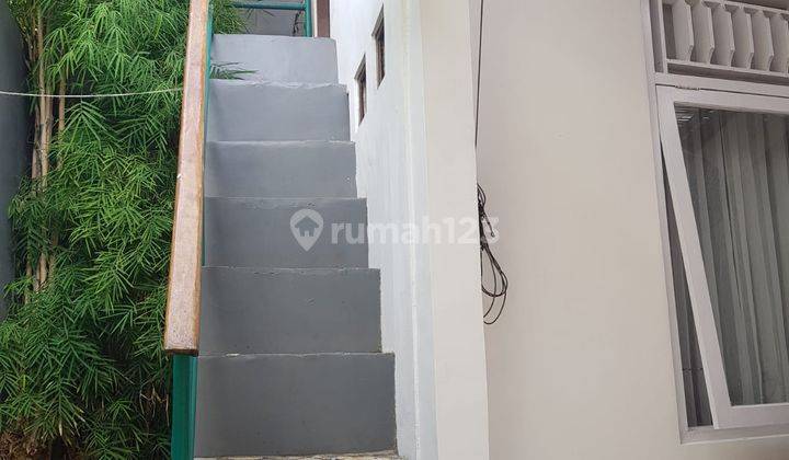 Rumah Minimalis Dengan Style Villa Kawasan Puri Gading 17