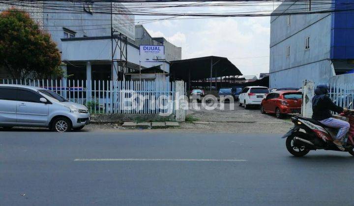 TANAH DAN BANGUNAN LOKASI SANGAT STRATEGIS DI JALAN UTAMA PAHLAWAN REVOLUSI PONDOK BAMBU 1