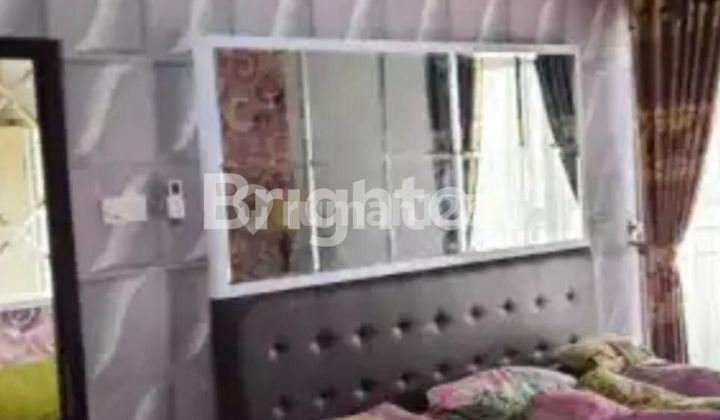 Rumah di Graha Raya Puri Paku Jaya Regency 2