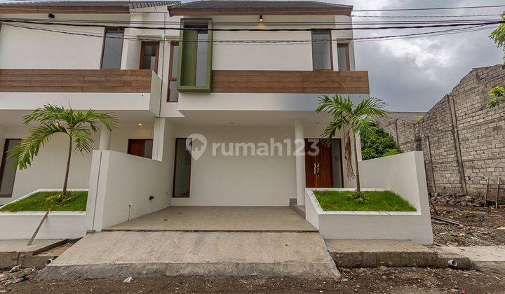 RUMAH KONTEMPORER DI GATSU TIMUR AREA PERKANTORAN 1