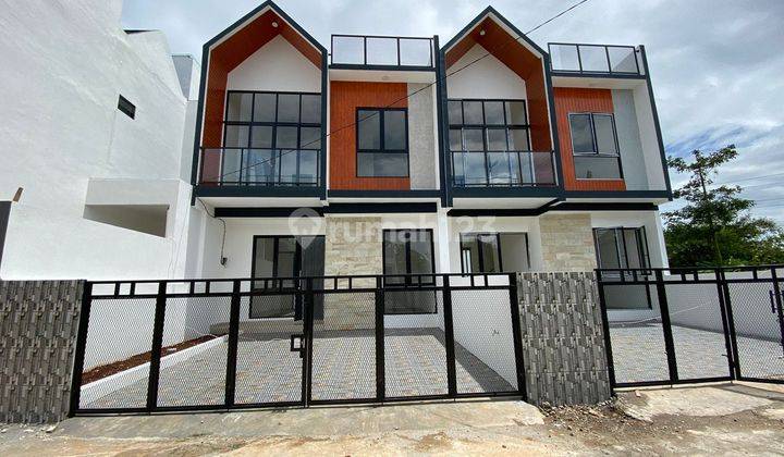 Rumah 2 Lantai Townhouse DP 40 juta-an Free Biaya Kanopi Dekat Tol  1