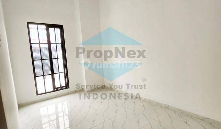 Jual rumah Kuwukan 2.5 lantai Lontar 2