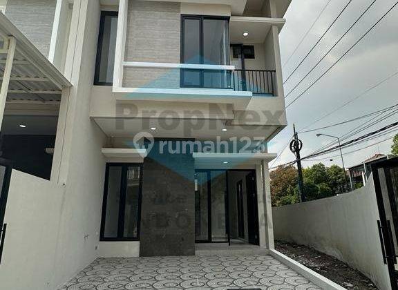 Jual Rumah Kutisari Indah Utara 2 lantai Baru pojok 1