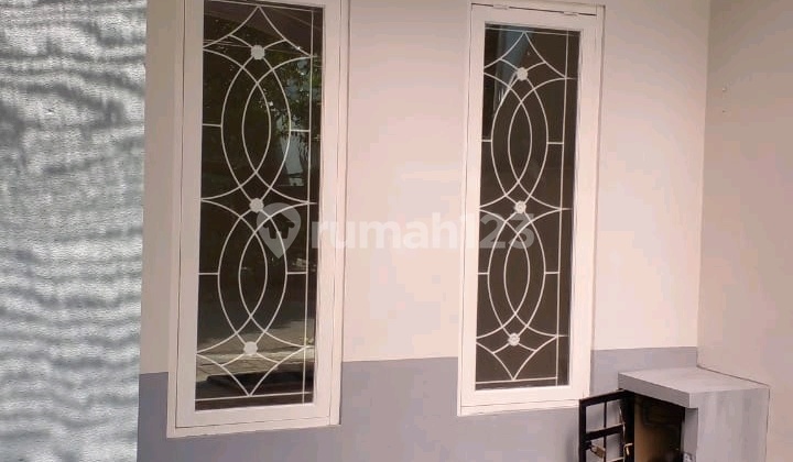 Rumah Palm Spring Jambangan 2