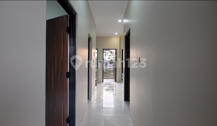 Rumah Lingkungan Cluster Mewah Cantik Menawan  2