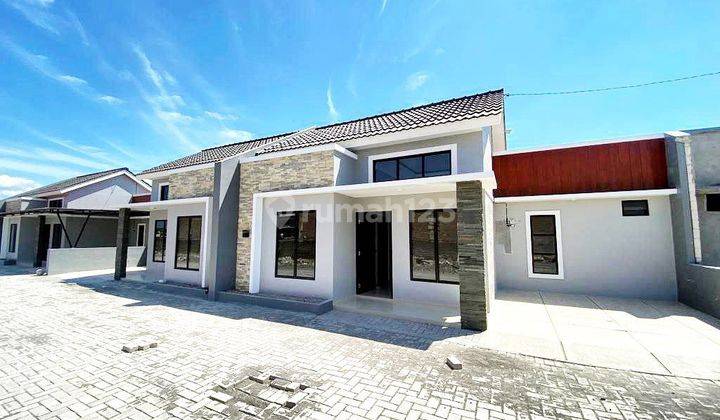 Rumah cluster Pesan Bangun pinggir jalan ramai 1