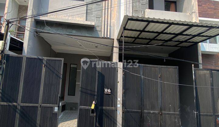 Dijual Rumah Taman Raru 2 Lantai Bagus Siap Huni Tanan Ratu 1