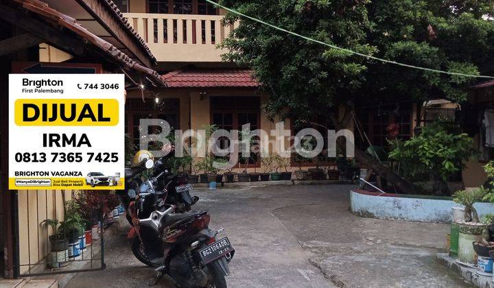 Rumah 2 Lantai Ditepi Jalan Tengah Kota 1