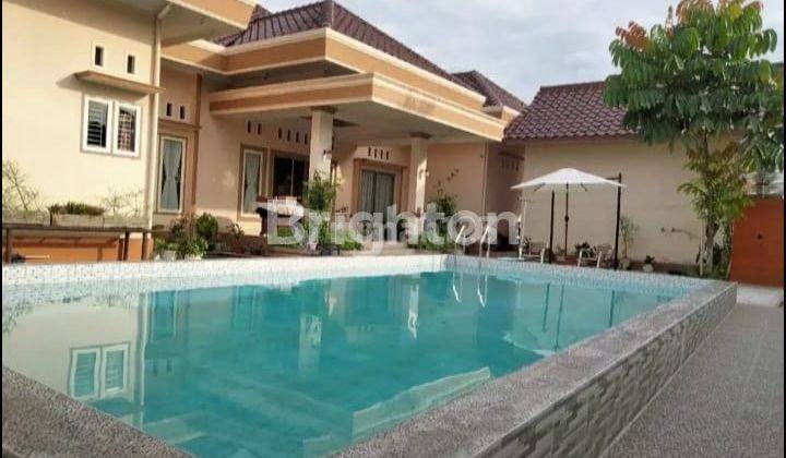 RUMAH SATU LANTAI MEWAH SIAP HUNI ADA KOLAM RENANG DEKAT PTC MALL 1