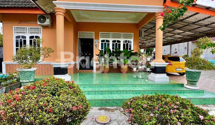 RUMAH DI PALEMBANG 1