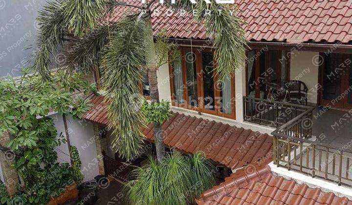 HITUNG TANAH RUMAH MODERN TROPIS MEGA KUNINGAN 1