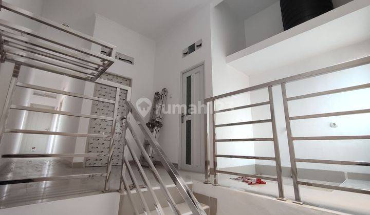 DIJUAL RUMAH BARU DI SIMPRUG PORIS SIAP HUNI, 2 LANTAI, KAMAR TIDUR 3 DAPAT KITCHEN SET  1