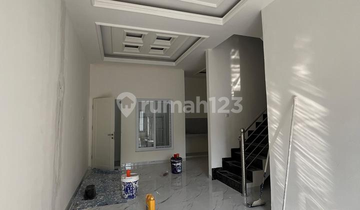 RUMAH SIAP HUNI 2,5 LANTAI KOMPLEK RINGROAD VILLE DAERAH RINGROAD 