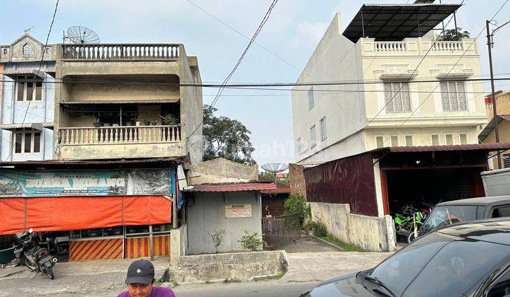 Dijual tanah dan bangunan di jl Williem Iskandar SHM hadap barat siap huni 1