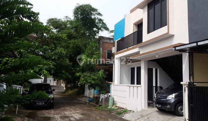 Rumah 2 Lantai di Greenwood SHM Bagus 1