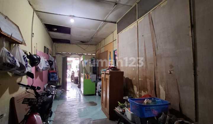 dijual rumahtua harga tanah jalan utama dekat sm raja 2