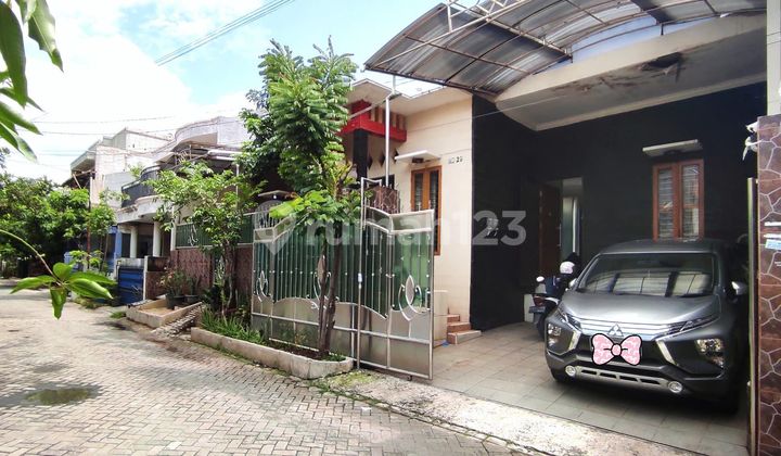 Spacious 190 sqm 4-bedroom house in Harapan Indah Bekasi, 2 floors, North-facing, with SHM certificate.