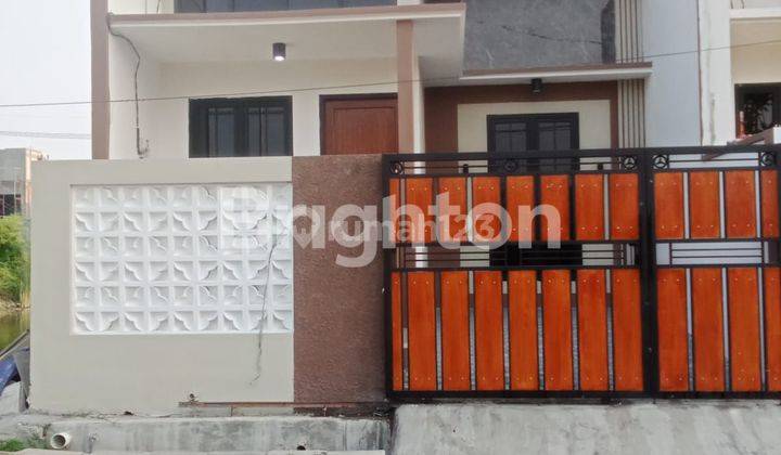 RUMAH MODERN GRESS DI WONOREJO TIMUR RUNGKUT SURABAYA 1