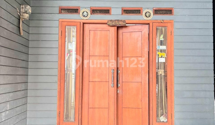 Rumah Town House yang Asri dan Mungil di Cijantung 1