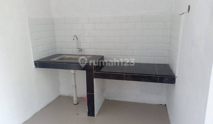 Rumah Baru Modern Nyaman bebas banjir pinggir jalan 6