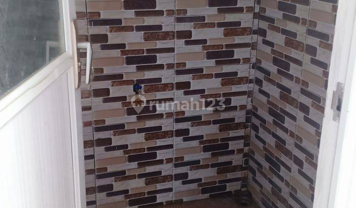 Rumah Baru Modern Nyaman bebas banjir pinggir jalan 7