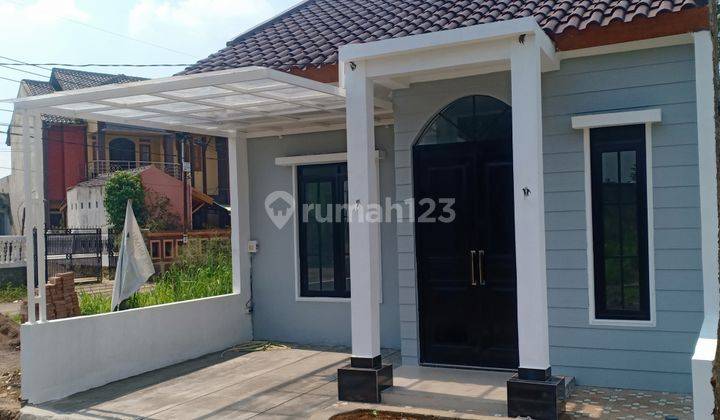 Rumah Baru Modern Nyaman Pinggir jalan bebas banjir SHM 1