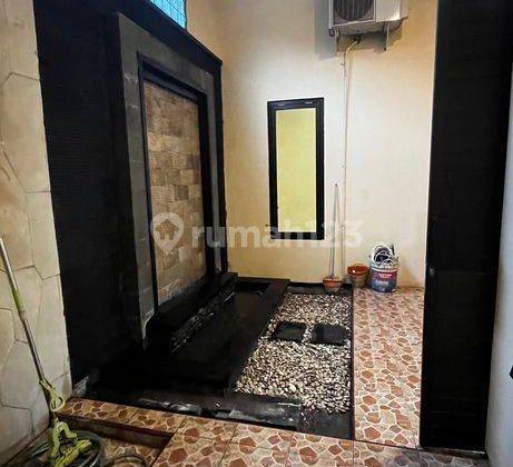 Rumah Asri di Palm Spring Regency Jambangan Surabaya 4