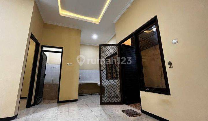 Rumah Asri di Palm Spring Regency Jambangan Surabaya 7