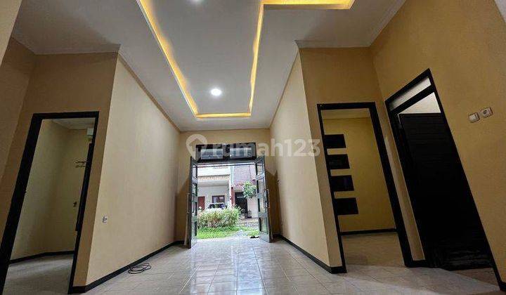 Rumah Asri di Palm Spring Regency Jambangan Surabaya 10