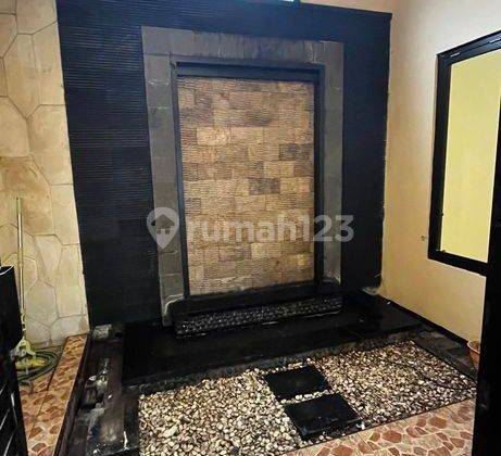 Rumah Asri di Palm Spring Regency Jambangan Surabaya 11