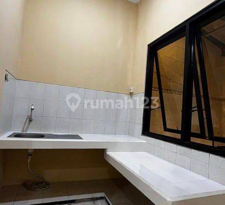 Rumah Asri di Palm Spring Regency Jambangan Surabaya 12