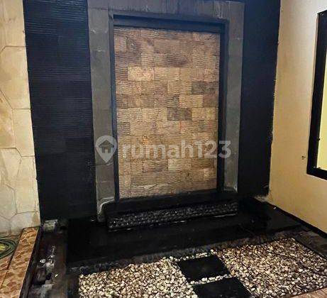 Rumah Asri di Palm Spring Regency Jambangan Surabaya 13