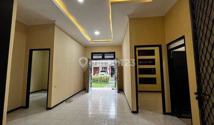 Rumah Asri di Palm Spring Regency Jambangan Surabaya 17