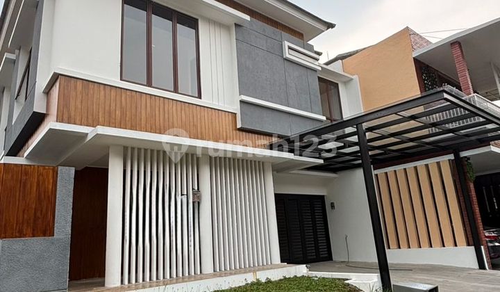 Rumah Dengan Kolam Renang Hadap Utara Di Discovery Bintaro Jaya 2