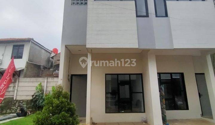 RUMAH BARU DENGAN ROOFTOP DI PRIVATE CLUSTER PINANG RANTI JAKTIM 2