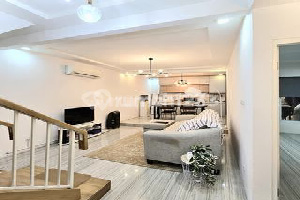 House in Bintaro Sector 2, in front of the park, very well-maintained and beautiful.