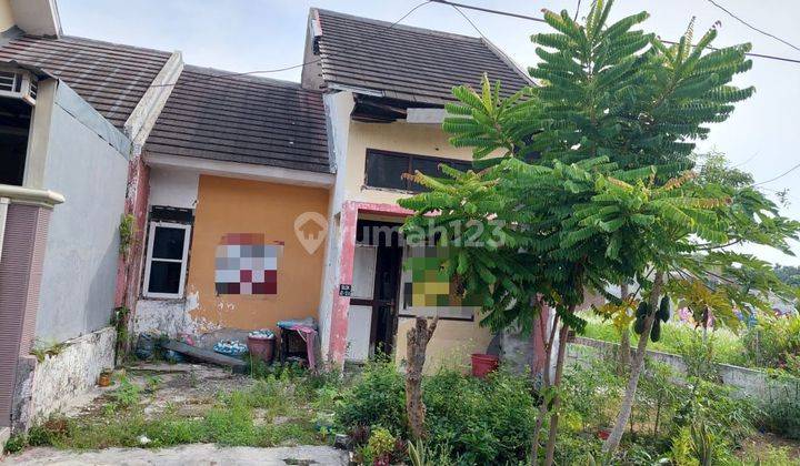 Rumah di Perum Palem Pertiwi Meganti Gresik 1