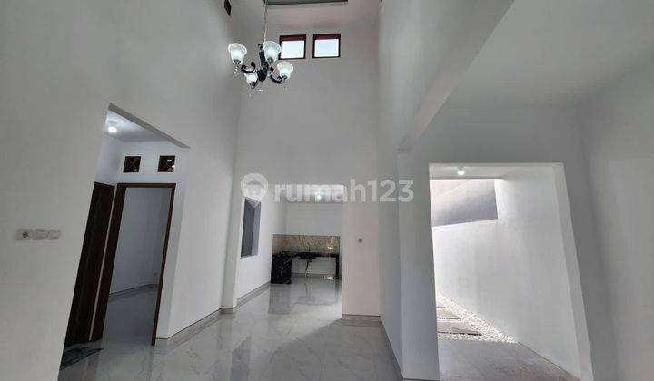 ruang tamu rumah minimalis graha taman bunga