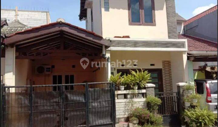 Rumah 1 1/2 lantai di perumahan griya taman tiga cinere 1