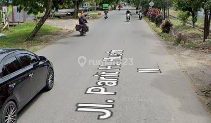 Tanah lokasi Parit H. Husni , jalan raya cocok utk ruko 3
