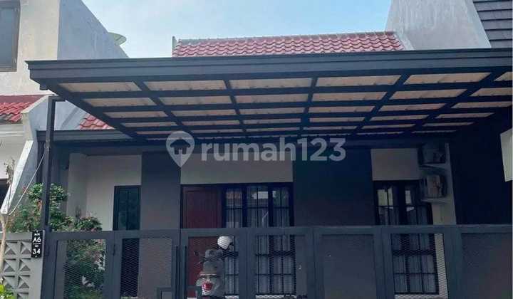 Rumah Minimalis Siap Huni Di Taman Puspa Raya Citraland Surabaya