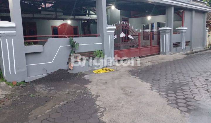 RUMAH TERLUAS PINGGIR JALAN RAYA 1