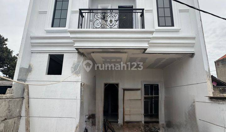 Rumah Cluster Pinggir Jalan Di Jagakarsa Bangunan Modern Classic  1