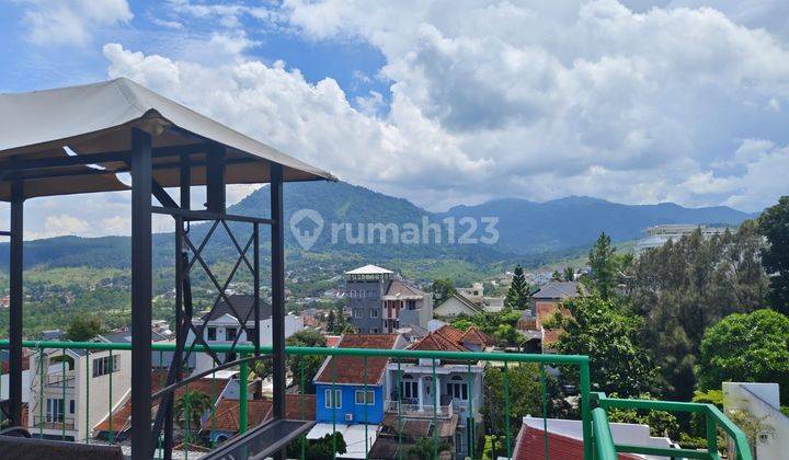 Rumah 3 lantai siap huni,Roftop,semi furnish,SHM,lokasi startegis di sentul city,view pegunungan  1