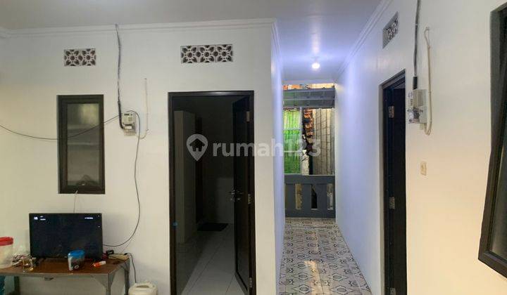 Rumah kontrakan dan kost an, 2 Lantai di Radio dalam 
 1